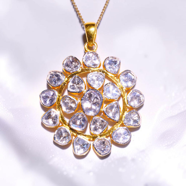Uncut polki diamonds hand-set in a gold cluster pendant by David Harry Jewels
